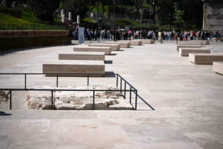 People walk in the new outdoor space created with travertine marble around the Colosseum during it’s inauguration in Rome, Tuesday, March 17, 2026. (Credit: Andrew Medichini/AP.)