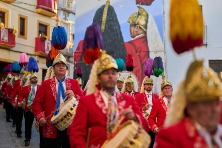 Members of the "White-tail Jews," march while playing drums alongside the Nuestro Padre Jesus del Huerto y San Diego brotherhood during a Holy Week procession in Baena, southern Spain, Wednesday, April 1, 2026. (Credit: Manu Fernandez/AP.)