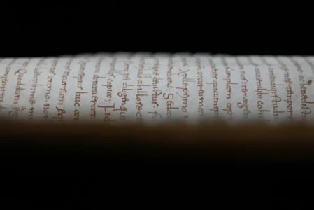 The 8th-century manuscript copy of the Venerable Bede's Ecclesiastical History of the English People, containing a rare, long-lost copy of Caedmon's Hymn — the first poem ever written down in Old English — is seen at Rome's National Library, Thursday, May 8, 2026. (Credit: Andrea Rosa/AP.)