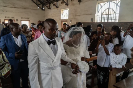 Celebrating a Catholic wedding amid the Ebola outbreak: No kisses, but love lives here