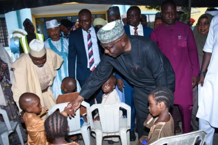 Kwara State Governor Abdulrahman Abdulrazaq greets children in a hospital in Ilorin, Nigeria, on Aug. 7, 2026. (Credit: Abubakar Khadijak/AP.)