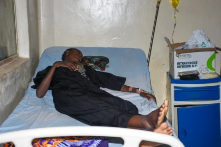 A woman who was rescued after being held in a forest after she was abducted from the Woro community by gunmen in February receives medical attention at a hospital Ilorin, Nigeria, on Aug. 7, 2026. (Credit: Abubakar Khadijak/AP.)