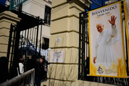 A banner of Pope Leo XIV is posted outside the Church of San Cayetano during the annual pilgrimage honoring Saint Cajetan, the patron saint of work, in Buenos Aires, Argentina, Friday, Aug. 7, 2026. (Credit: Natacha Pisarenko/AP.)