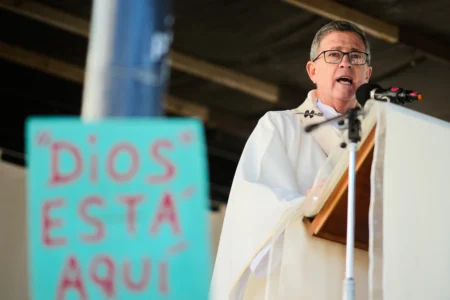 Archbishop Jorge Garcia Cuerva celebrates an outdoor Mass outside the Church of San Cayetano during the annual pilgrimage honoring Saint Cajetan, the patron saint of work, in Buenos Aires, Argentina, Friday, Aug. 7, 2026. (Credit: Natacha Pisarenko/AP.)