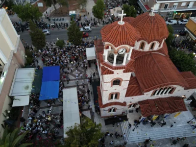 Pilgrims wait in line to have their Fanouropites, orange-flavored cakes, blessed at the Church of St. Fanourios in Athens, Wednesday, Aug. 26, 2026. (Credit: Thanassis Stavrakis/AP.)