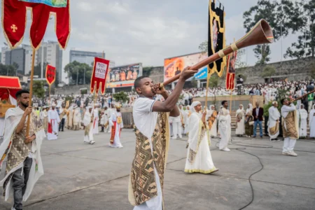 Members of an Orthodox choir perform during celebrations for the Orthodox holiday of Meskel, an annual holiday celebrating the discovery of the True Cross in the fourth century by the Roman Empress Helena, in Addis Ababa, Ethiopia, Saturday, Sept. 26, 2026. (Credit: Amanuel Sileshi/AP.)